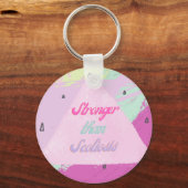 脊柱症よりも強い – ピンク キーホルダー (正面)