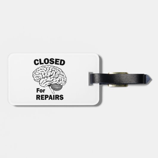 脳が修理のために閉じられている ラゲッジタグ (裏面横)