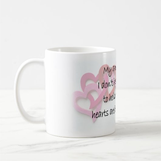 腕が一杯だ コーヒーマグカップ (左)