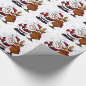 腕のサンタおよびトナカイの永続的な腕 ラッピングペーパー (角)