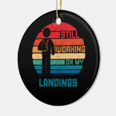 腕の骨折した子どもが踊り場で働き始める セラミックオーナメント (左)