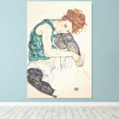 膝に頭を付けた着席した女性 キャンバスプリント (インサイチュ (ウッドフロア))