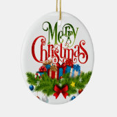 自分で「聖降誕祭お目出とう」というオーナメントを持っている セラミックオーナメント (右)