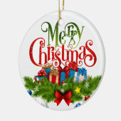 自分で「聖降誕祭お目出とう」というオーナメントを持っている セラミックオーナメント (左)