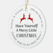 自分に小さなメリークリスマスのトナカイClを持っている セラミックオーナメント (左)