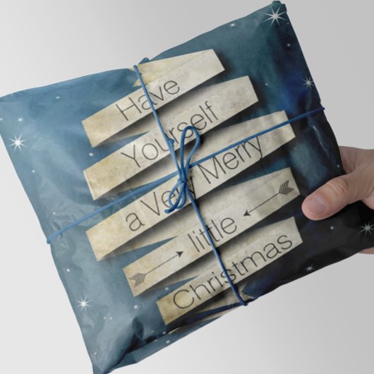 自分に小さなメリークリスマスの星を持っている 薄葉紙