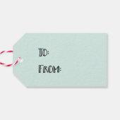 自分に小さなメリークリスマスギフトタグを持っている ギフトタグ (裏面横)