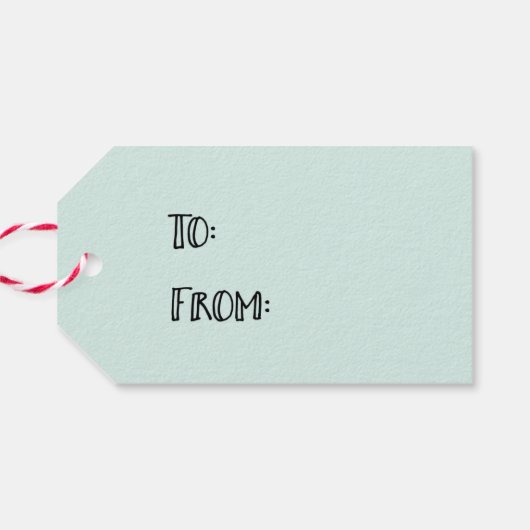 自分に小さなメリークリスマスギフトタグを持っている ギフトタグ (裏面横)