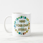 自分の子宮を気にする | 力を付けるフェミニストフローラ コーヒーマグカップ (左)