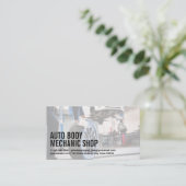 自動体ショップ | 整備士が新しいタイヤに乗る 名刺 (スタンド正面)