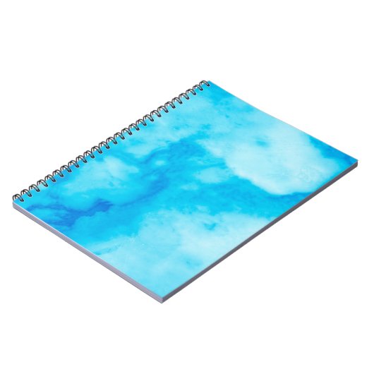 自然なパターンを持つ青い白の大理石のテクスチャ ノートブック (左側)