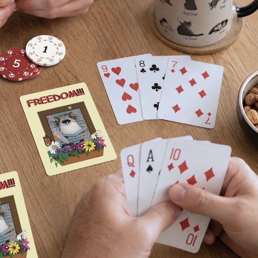 自由への脱出 面白い猫 黄色い花柄の窓 トランプ