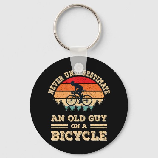 自転車で老人を甘く見てはいけないおもしろい キーホルダー (正面)