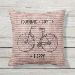 自転車と幸せで旧式なバイクのピンクに匹敵します クッション