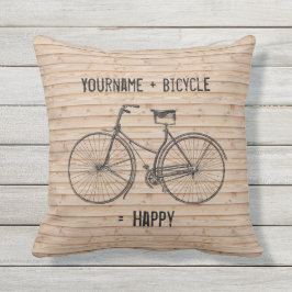 自転車と幸せで旧式な木製ベージュ色に匹敵します クッション