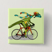 自転車に乗ったアナビセチア恐竜。 缶バッジ (正面)