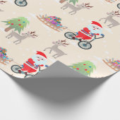 自転車に乗った可愛いサンタのクリスマスパターン ラッピングペーパー (角)