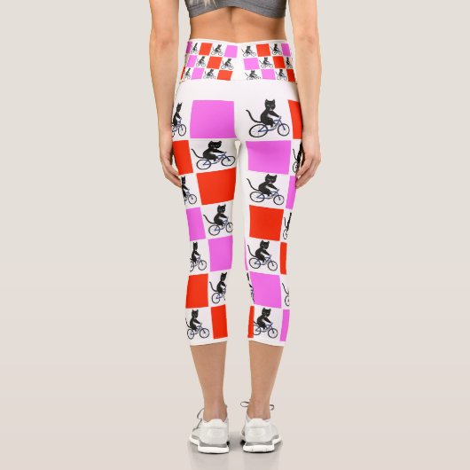 自転車に乗った猫キャットスポーティなサイクリストおもしろい カプリレギンス (裏面)