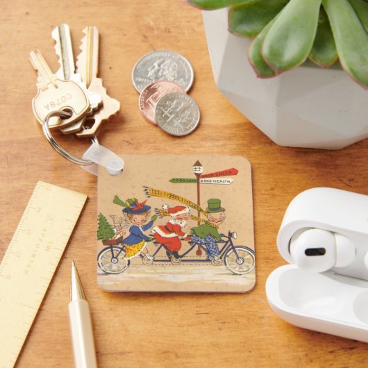自転車に乗るサンタクロース、ビンテージクリスマス キーホルダー (デスク)