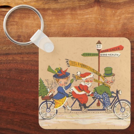 自転車に乗るサンタクロース、ビンテージクリスマス キーホルダー (正面)