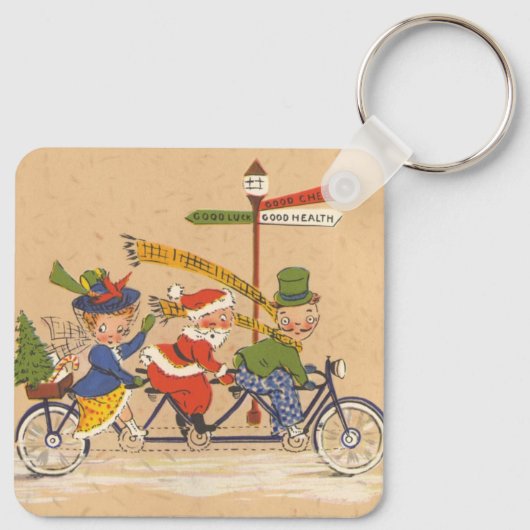 自転車に乗るサンタクロース、ビンテージクリスマス キーホルダー (裏面)