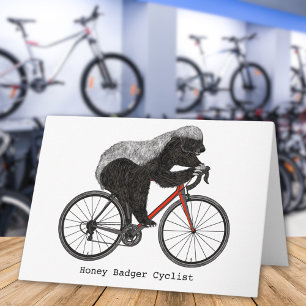 自転車に乗るハチミアナグマ カード