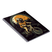 自転車に乗るパグの子供向けアニメーション ノートブック (右側)