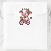 自転車に乗る茶色と白の牛 ラウンドシール (バッグ)