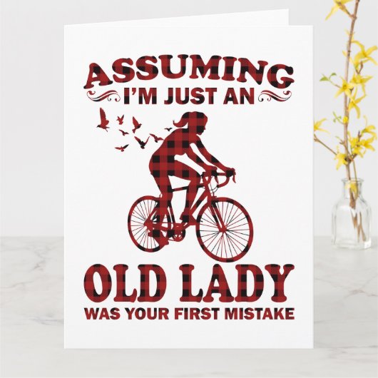 自転車の女性 私がただのクリスマスの老婆だと思ってる カード (黄色い花)