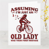 自転車の女性、私はクリスマスのただの老婆だと思ってる カード (黄色い花)