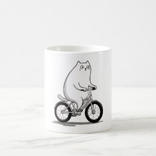 自転車の漫画に乗ってかわいい丸っぽい猫 コーヒーマグカップ