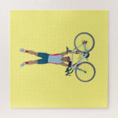自転車を持ち上げるサイクリスト ジグソーパズル (横)