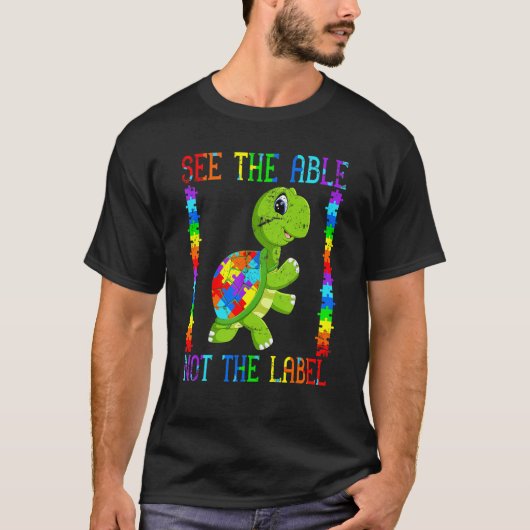 自閉症の子を持つ母のためのタートルファイター・パズル 自閉症 Tシャツ (正面)