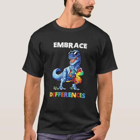 自閉症の恐竜 差異を受け入れるシャムロックパズル Tシャツ (正面)