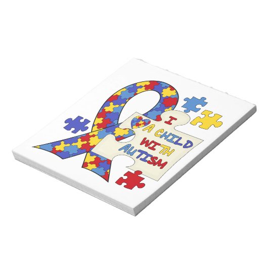 自閉症の認識度のリボンを持つ子供 ノートパッド (回転)
