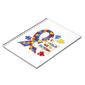 自閉症の認識度のリボンを持つ子供 ノートブック (左側)