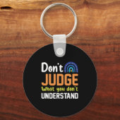 自閉症を理解していないものを判断してはいけない キーホルダー (正面)