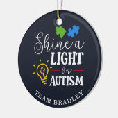 自閉症パーソナライズされたマッチングチームに光を当てる セラミックオーナメント (左)