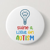 自閉症ボタンに光を当てる 缶バッジ (正面)