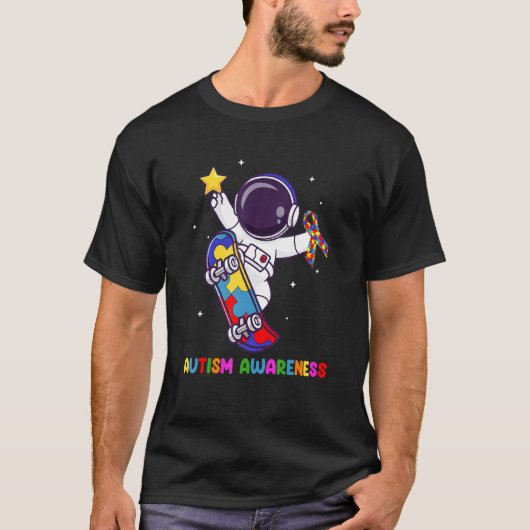 自閉症啓発活動をする宇宙飛行士カラフルリボンパズル Tシャツ (正面)