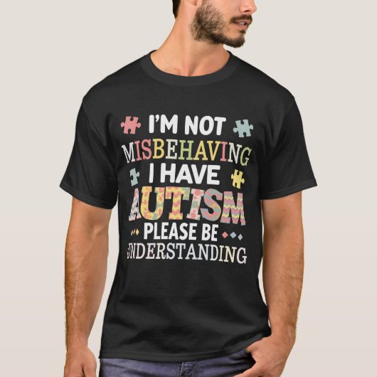 自閉症啓発 私は不適切な行動をしているわけではありません Tシャツ (正面)