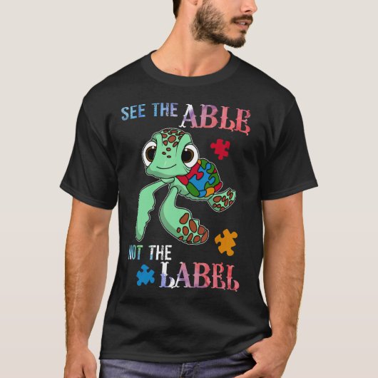 自閉症 - ラベルではなく能力を見て! かわいい自閉症啓発 Tシャツ (正面)