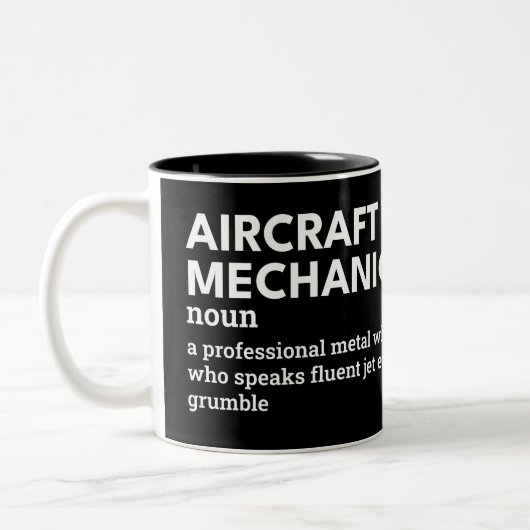 航空おもしろい機整備士定義 ツートーンマグカップ (左)