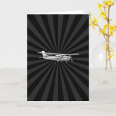 航空機のクラシックなセスナのシルエットの日が差すこと カード (黄色い花)