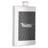 航空機のクラシックなセスナのシルエットの飛んでいるな日が差すこと フラスク (右)