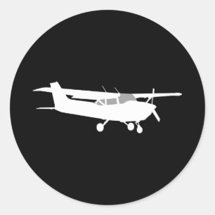 航空機クラシックセスナ飛んでいるシルエットオンブラック ラウンドシール