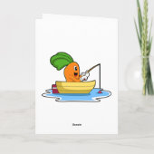 船に乗ったニンジンと釣り竿で釣りを楽しむ カード (裏面)