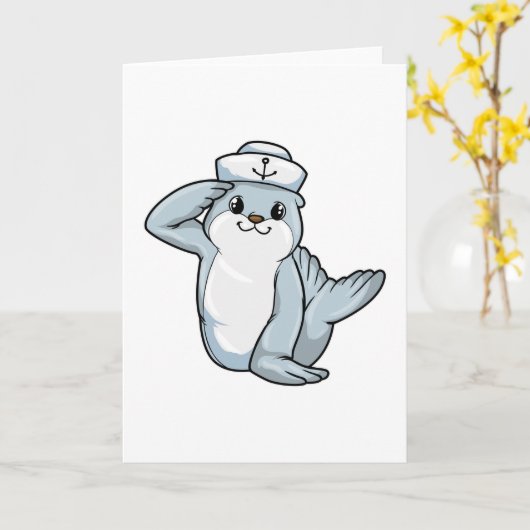 船の男の子としてサルの帽子をかぶったアザラシ カード (黄色い花)