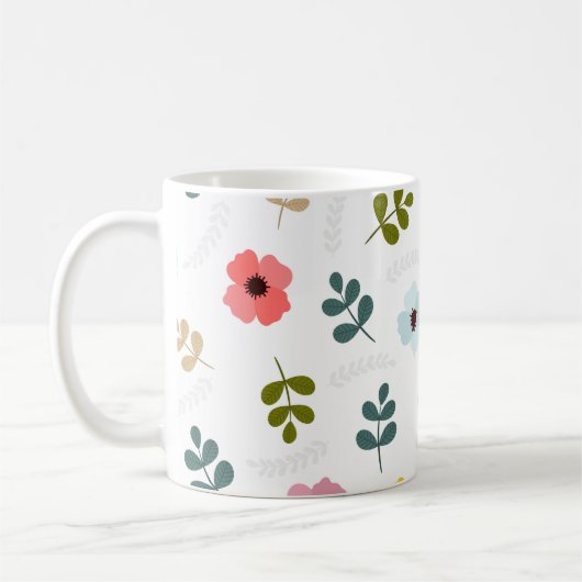色とりどりの花と緑の葉 コーヒーマグカップ (左)