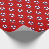 色の背景上の青い救命具 ラッピングペーパー (角)